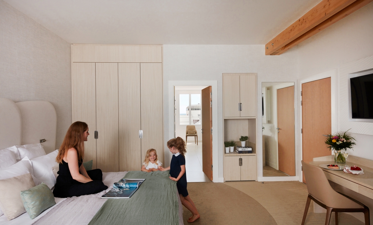 A family in the apartment’s bedroom